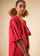A Model Wearing Red Organic Cotton Coral Sunset organic cotton dress, curated by Only Ethikal